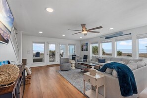 As you step inside, prepare to be bathed in sunlight streaming through the expansive floor-to-ceiling windows. The warm rays not only illuminate the space but also create a soul-soothing ambiance. 