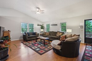 Furniture, Indoors, Living Room, Couch, Floor