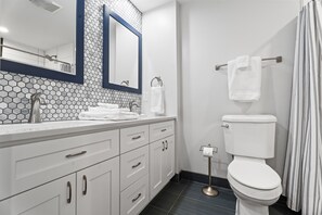 Master bathroom with 2 sinks and 2 showerheads for a full spa experience.