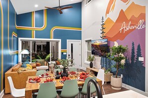 Living/Dining area. Custom mural painted by local artist. Isn't it lovely?