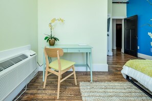 Suite 101 – The 1st Floor Van Gogh Suite boasts a Casper King Bed, Smart TV, and private En Suite with Claw-Foot Tub
