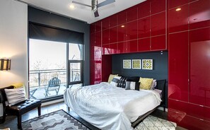 Bedroom with King bed, balcony, and en suite
