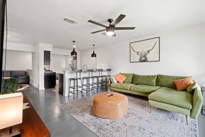 Curl up in the stylish living room & stream all your favorite entertainment