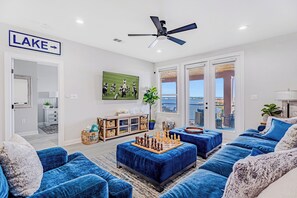 Cozy and spacious living area with TV and board games