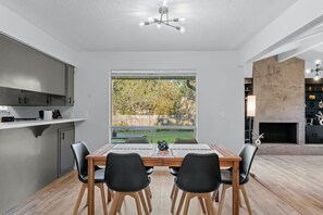 Gather for meals together at the dining table, with seating for 6