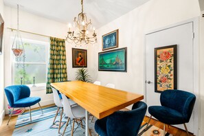 Gather for meals at the Dining Table, offering seating for 6