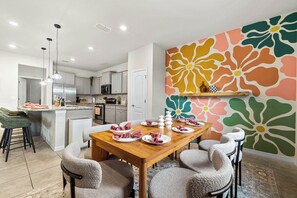 Kitchen is steps away from the dining area