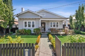 This gorgeously renovated home offers 2 bedrooms and 2 bathrooms, a large yard and open plan living.