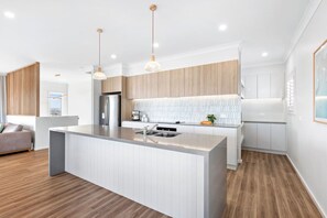 Kitchen- Fully equipped with top end appliances for cooking as you would at home. Butlers pantry and coffee machine!