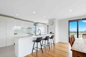 Kitchen has all modern appliances, pantry essentials, cookware and dinnerware,  coffee pod machine and is perfect for self-catering.