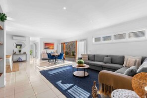 North facing open plan living, dining and kitchen- filling this large space with so much natural light!