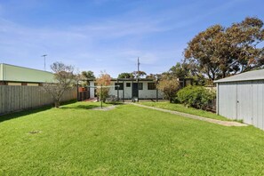 Large fully enclosed yard great for the kids and pets!