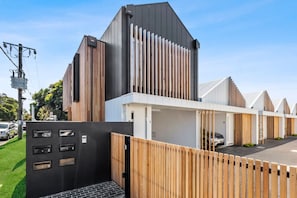 Single car garage included in the house, with street parking available for additional vehicles.