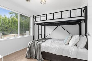 The second bedroom has a tri bunk (double on the bottom/single on top)