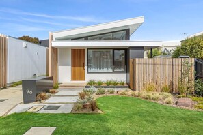 Single car garage included in the house, with street parking available for additional vehicles.