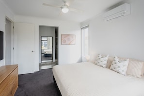 Master bedroom w King bed and luxury linen