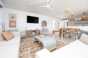 A spacious and airy living area, perfect for relaxing after a day in the sun.