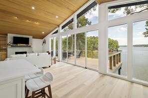 Living room, deck and lake views