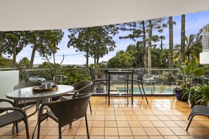 Balcony with a pool view