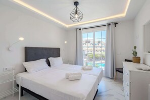 Main Bedroom with Double Bed, Wardrobe, Room Darkening Shades and Pool View