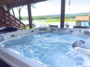 Hang out in the covered hot tub and enjoy the lake view. What can be better?