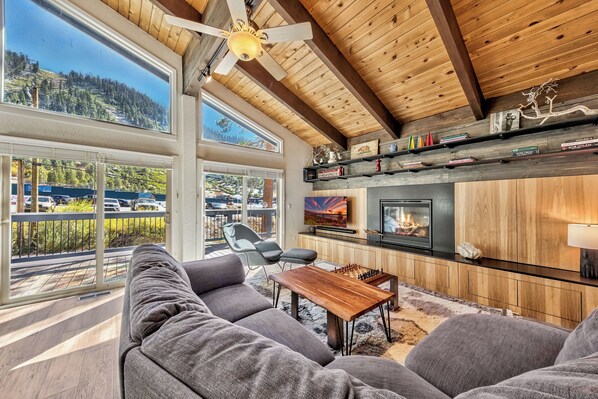 Enjoy the gas fireplace while getting comfortable for movie night in the living room