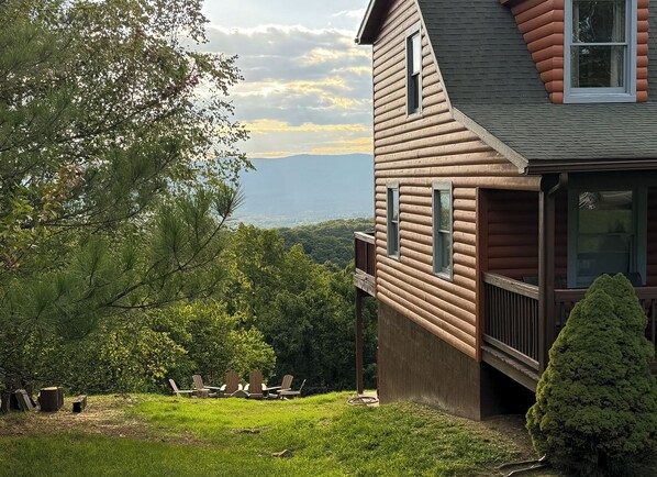 Exterior view over firepit. 