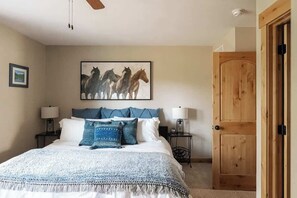 Primary bedroom with a king bed