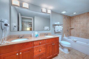 Get ready for a night on the town in this spacious bathroom with double sinks.