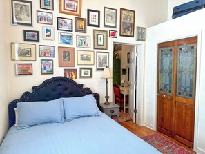 First bedroom, decorated with authentic New Orleans artwork and decor