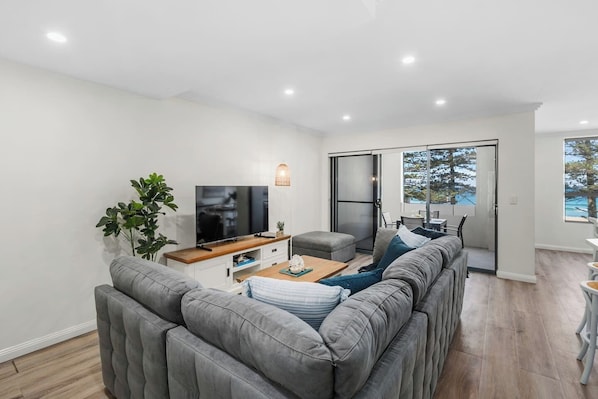 Get comfortable in the living room, whether you’re unwinding with a good book or enjoying a spot of TV.
