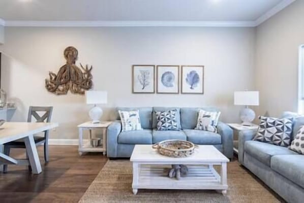 Spacious family room with new couch and loveseat 