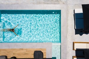 Unwind by your private pool in the tranquil setting of Pigi Village.