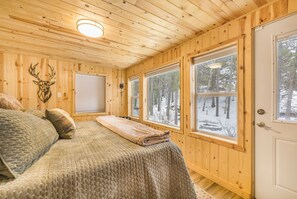 bedroom #2 on main level w/ king bed and private exterior door