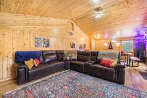 upper level living room w/ balcony