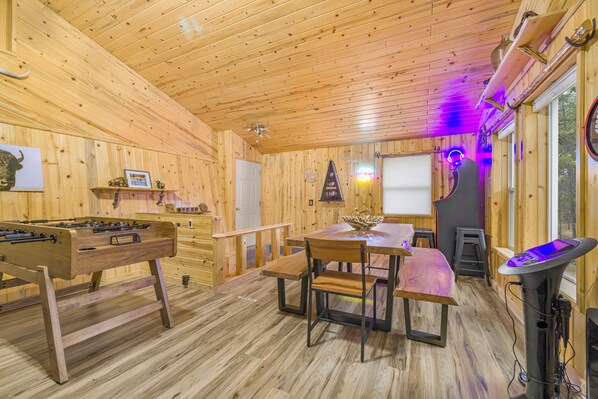 foosball table on upper living room w/ balcony
