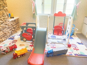 Room 202 has a working car and slide