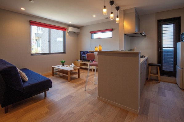 The living room and kitchen.