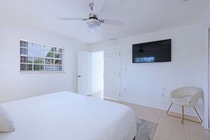 Our master bedroom with a King size bed, smart TV & private bathroom.