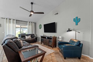 Welcome to the heart of our stylish retreat! Our living room exudes comfort and modern charm, featuring plush furnishings and contemporary decor. 
