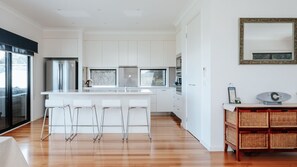 Upstairs Kitchen, dining table to the left