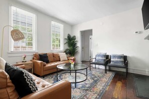 Spacious living room with plenty of seating space for your group! 