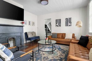 Spacious living room with plenty of seating space for your group! 