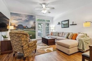 Birdies & Beaches livingroom with signature mural 2