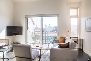 Living room with Fiserv Forum directly across the street