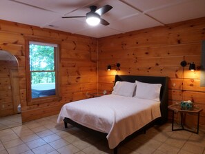 Spacious downstairs queen bedroom, quiet, with a dresser and large closet.
