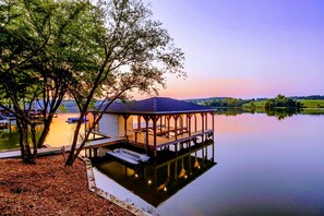 Unwind at this tranquil lakeside haven with a private dock, perfect for sunset views and serene water activities