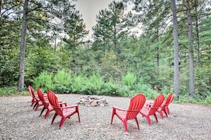 Outdoor Fire Pit: Gather around vibrant chairs for unforgettable evenings under the stars!