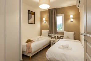 Relax on the comfy bed after a day outside.
