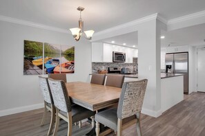 The dining room table has seating for 6 guests
